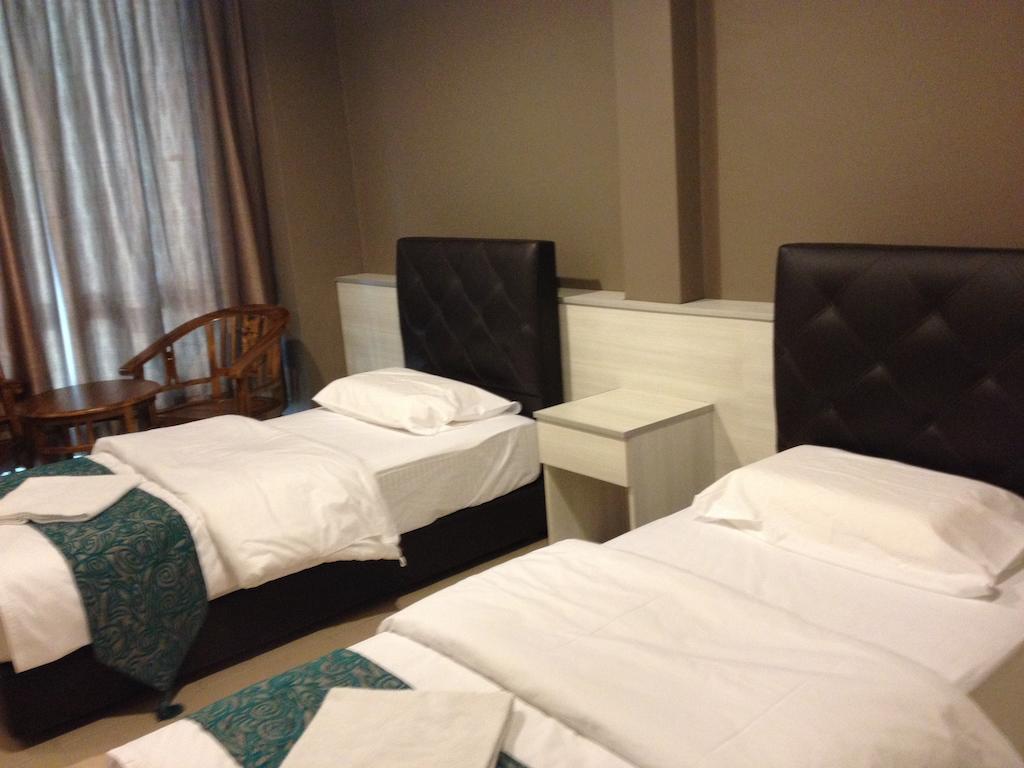 Aero Star Hotel Серембан Стая снимка