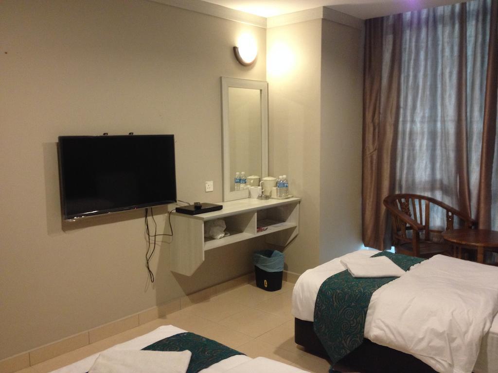 Aero Star Hotel Серембан Стая снимка