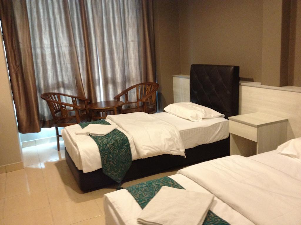 Aero Star Hotel Серембан Стая снимка